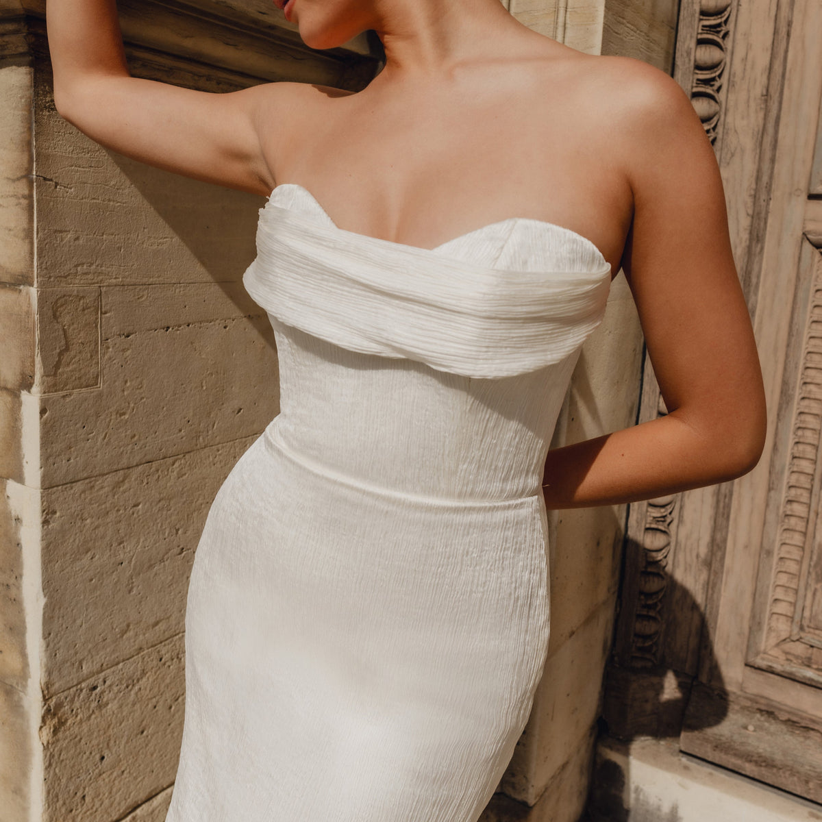 Venus : A strapless mermaid wedding gown with a front cowl – Aesling