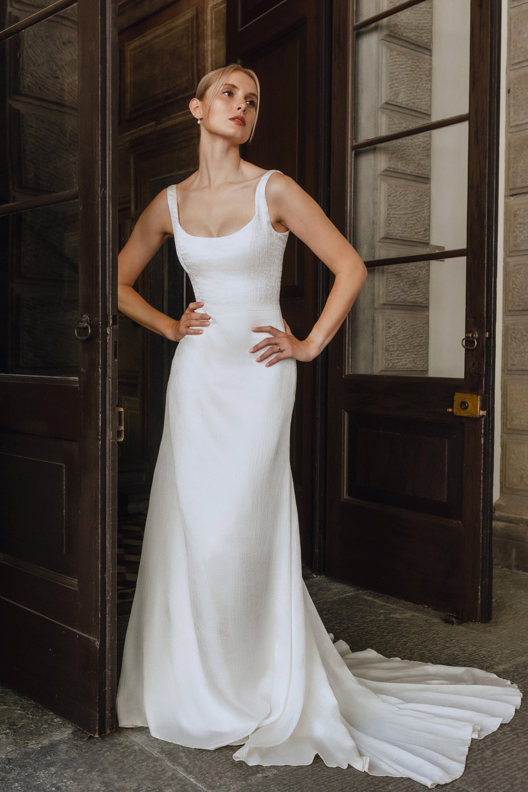 Camille : A mermaid wedding gown with a shallow scoopneck and back buttons