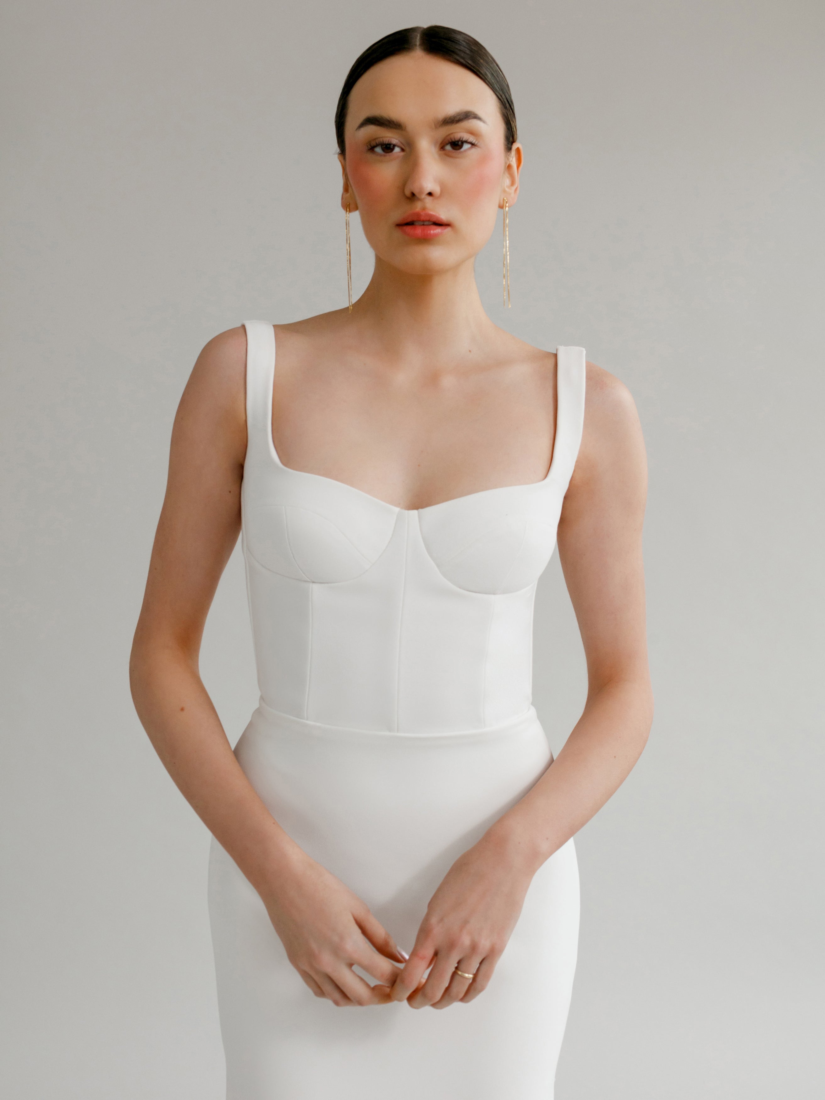 Angelica : A wedding gown with a bustier-style bodice + low back