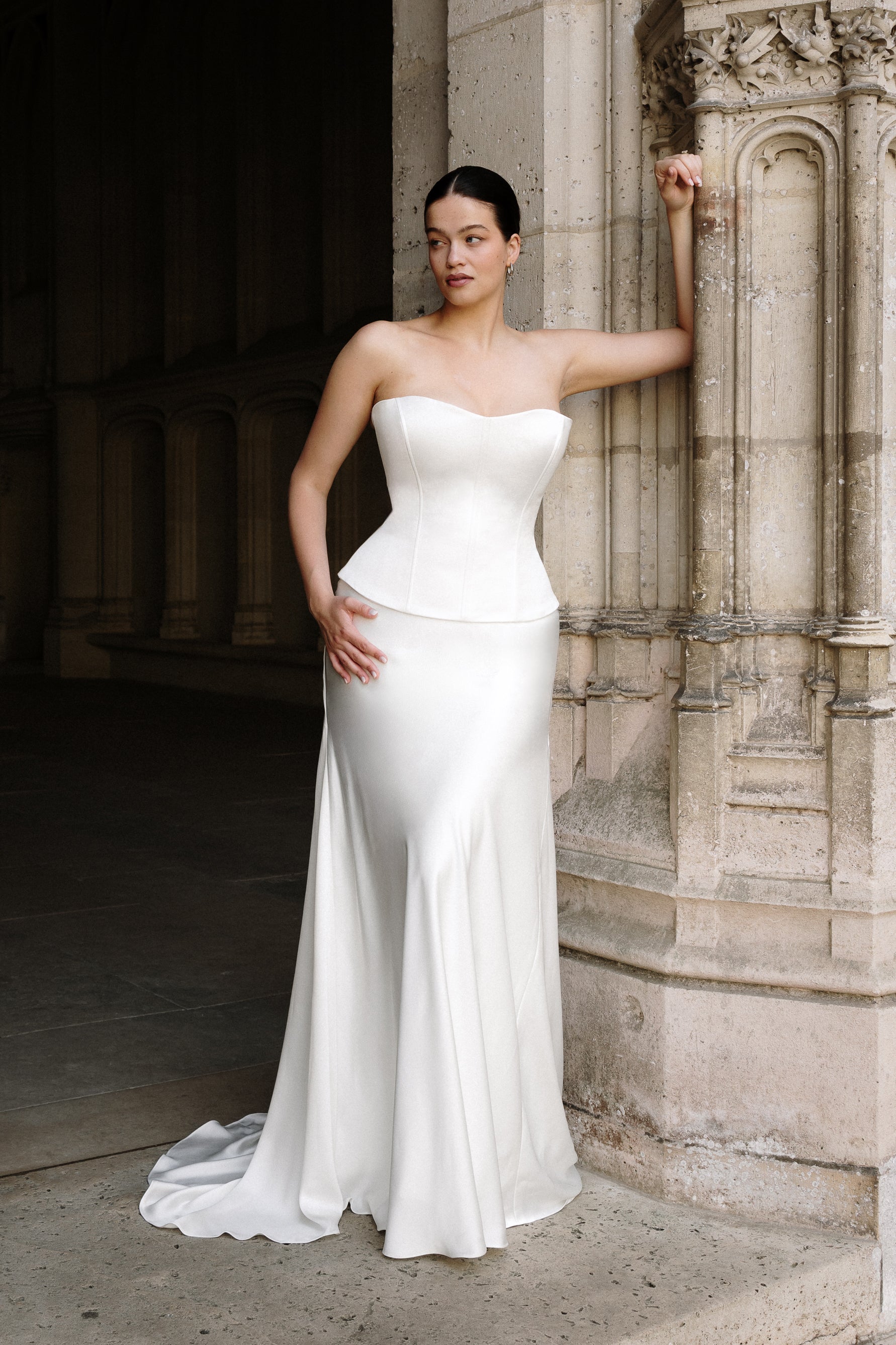 Alba : A satin wedding gown with a corseted bodice, dropped waist, and slip skirt