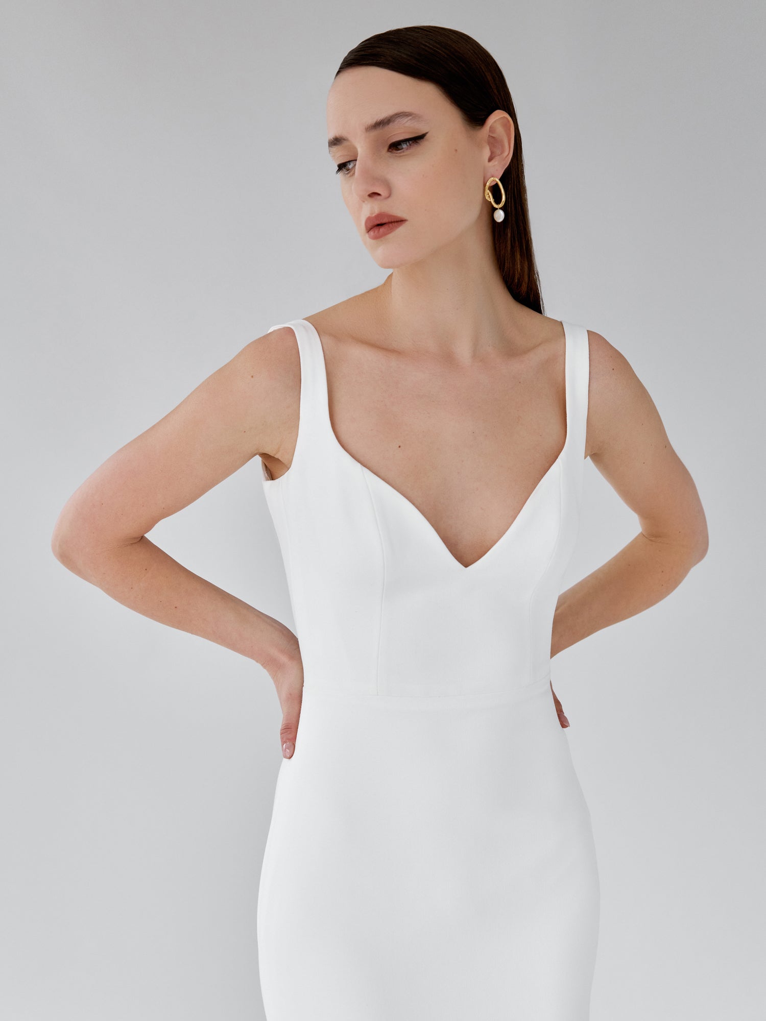 Marion | Sleeveless : (Adj.) Subtle, artful; a form carved from Cararra marble.
